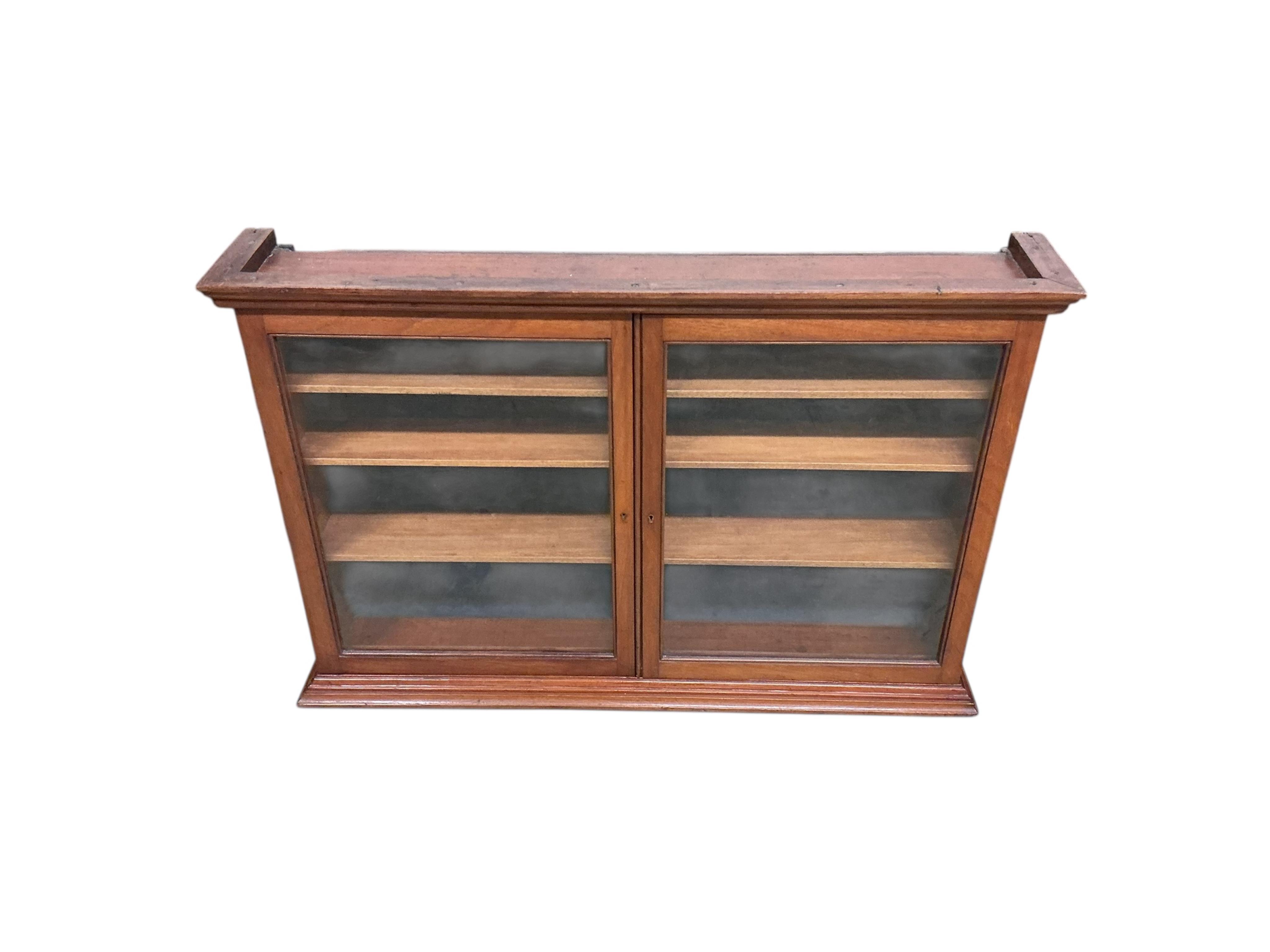 An early 20th century mahogany wall hanging display cabinet, width 96cm, depth 17cm, height 65cm